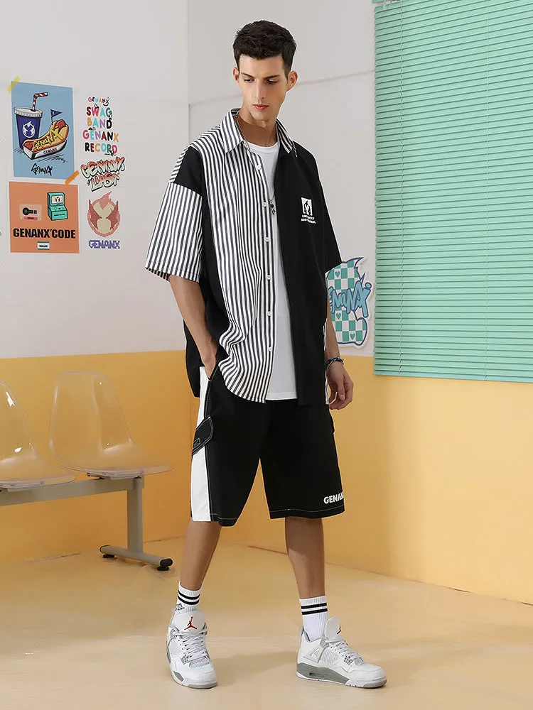 Black and white contrast side stripe letter print baggy quarter shorts with multiple pockets